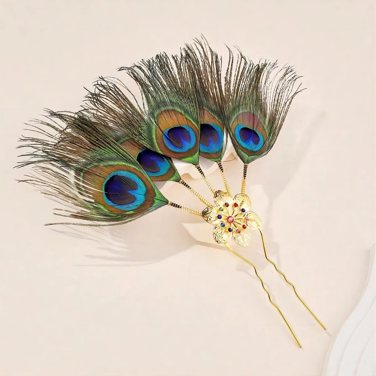 Peacock feather colored sparkle headdress pin